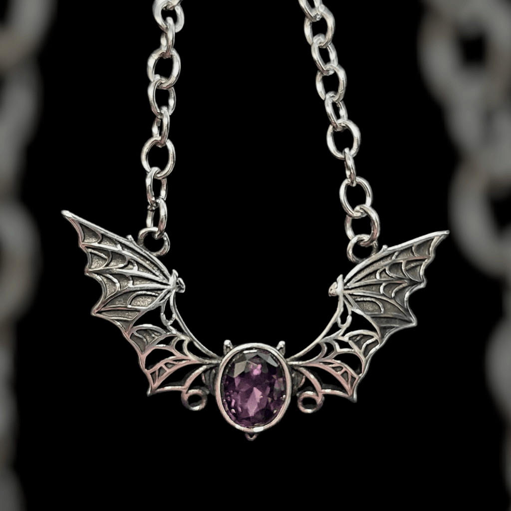 Bat necklace with purple stone