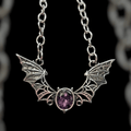 Bat necklace with purple stone