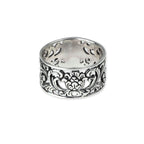 Wide silver ring with floral ornaments, openwork. Ring width 12 mm, Material: 925 sterling silver.