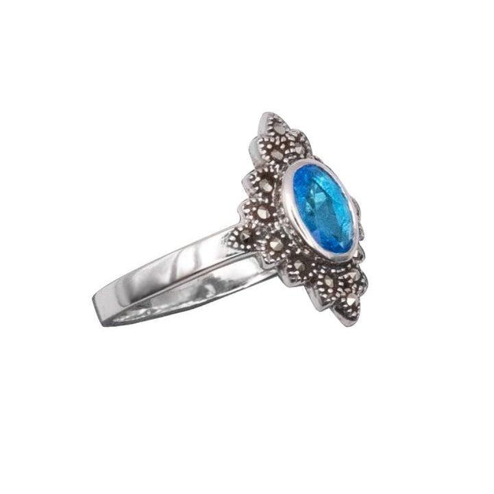 Ring with marcasite and artifitcial topaz width 16 mm, Material: 925 sterling silver, marcasite and zirconia.