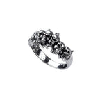 Silver ring with small skulls and bones. Ring size 10 mm, Material: 925 sterling silver.