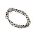 Bracelet made of polished stainless steel, curb chain with barbed wire elements and carabiner clasp. Width: 10 mm, Length: 18 cm + 2 cm extension.