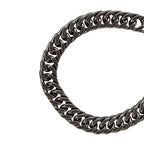 Stainless steel bracelet, oxidized finish, curb chain with lobster clasp. Width: 10 mm, Length: 20 cm.