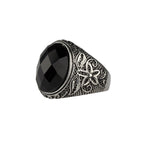 Stainless steel ring with large black, faceted stone and floral design on the sides, Width: approx. 2.0 cm, Material: stainless steel with faceted zirconia.