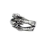 Since the ring is not completely closed, the size of the individual ring can be varied minimally. Width: approx. 1.3 cm, Material: stainless steel.