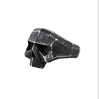 This ultra-cool "Dirty Skull" ring boasts a stainless steel oxidized hard rock style. Crafted with durable materials, this unique piece offers a bold and edgy look. Perfect for fans of rock and roll fashion, this ring is sure to make a statement