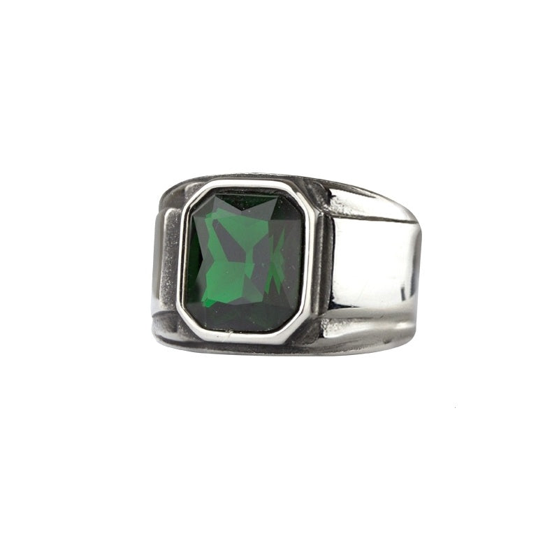 Simple stainless steel signet ring with a large green, faceted stone, Width: approx. 1.6 cm, Material: stainless steel with faceted zirconia.