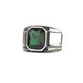 Simple stainless steel signet ring with a large green, faceted stone, Width: approx. 1.6 cm, Material: stainless steel with faceted zirconia.