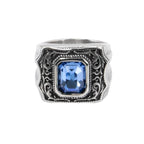 Ornamented stainless steel signet ring with faceted large blue stone, Width: approx. 1.9 cm, Material: stainless steel with faceted zirconia.