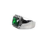Expertly crafted, the RING SPARKLING GREEN is a sleek stainless steel signet ring with a Celtic pattern and a large green faceted stone. Made with durable stainless steel and adorned with a sparkly zirconia, this ring is the perfect addition to any outfit.