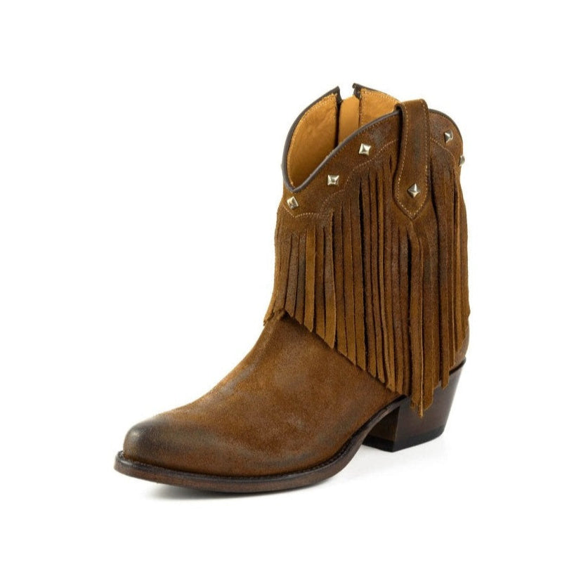 Brown cowboy boot with fringes and studs on a white background