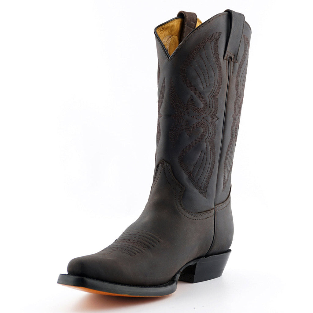 Premium Tall Western Cowboy Boots Handcrafted in Mexico - 100% Genuine Brown Leather. Discover the exceptional Louisiana tall Western cowboy boots, meticulously handcrafted in Mexico using 100% genuine leather throughout. These premium tall boots feature an authentic 31cm shaft height, intricate Western stitch detailing, pointed toe, and versatile unisex styling that works for both men and women who appreciate authentic Mexican bootmaking tradition and all-leather quality craftsmanship.