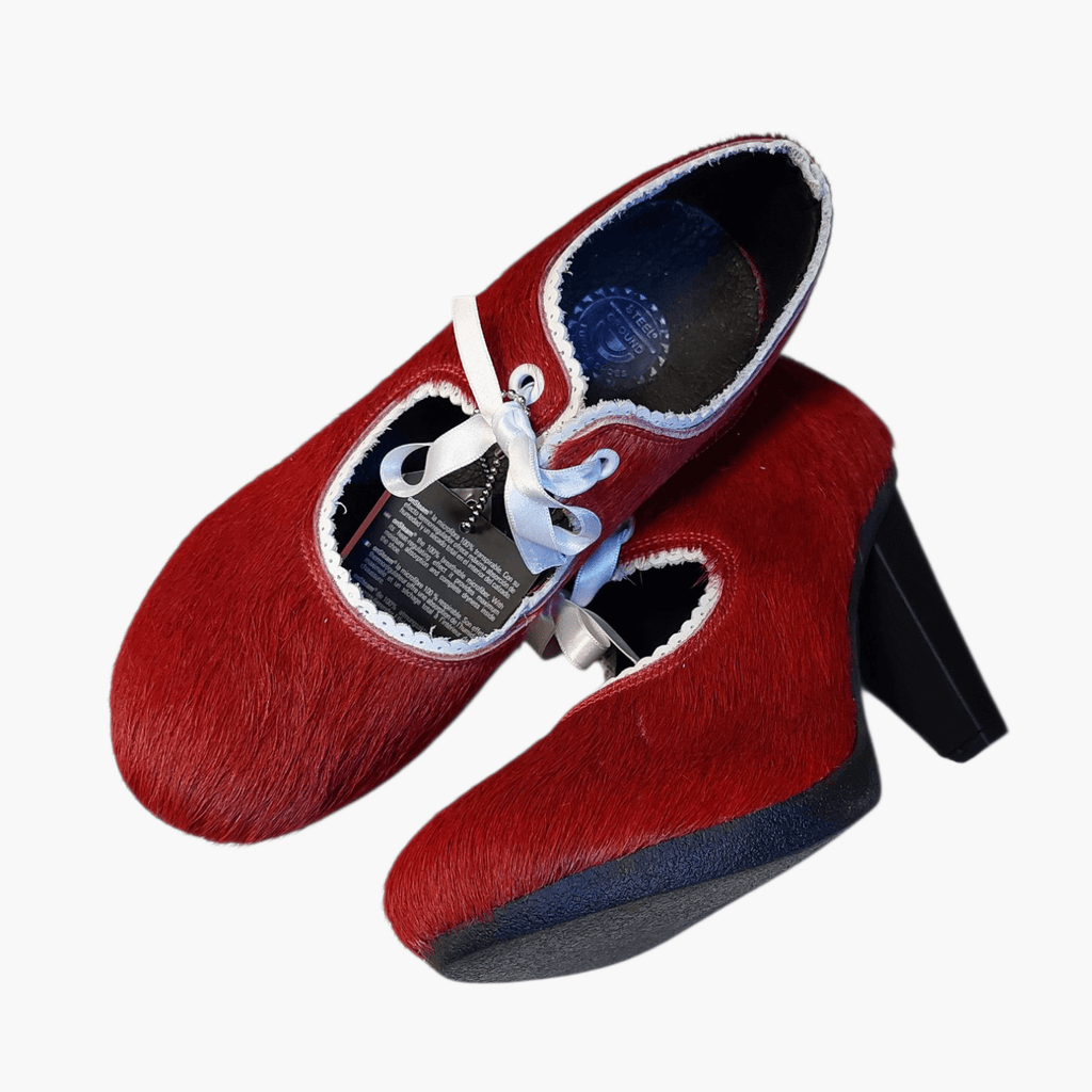 Women's pumps - red furry leather shoes with white leather lace trim, small lace-up design, and a seductive 8 cm high heel. Heels not only boast style and quality, but also offer great comfort with round ends and microfiber inner soles. Elevate your look with these premium shoes, perfect for fashion-forward women like you.
