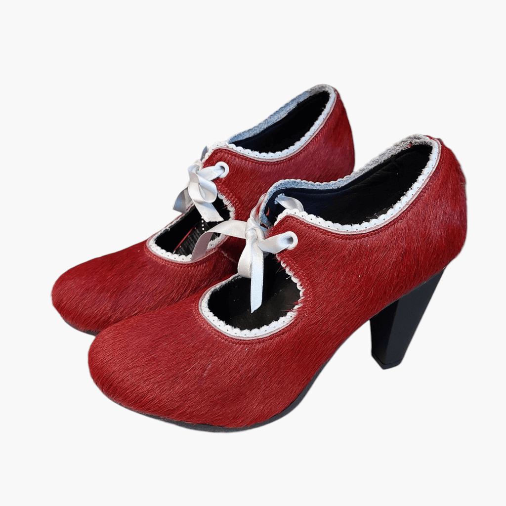 Women's pumps - red furry leather shoes with white leather lace trim, small lace-up design, and a seductive 8 cm high heel. Heels not only boast style and quality, but also offer great comfort with round ends and microfiber inner soles. Elevate your look with these premium shoes, perfect for fashion-forward women like you.